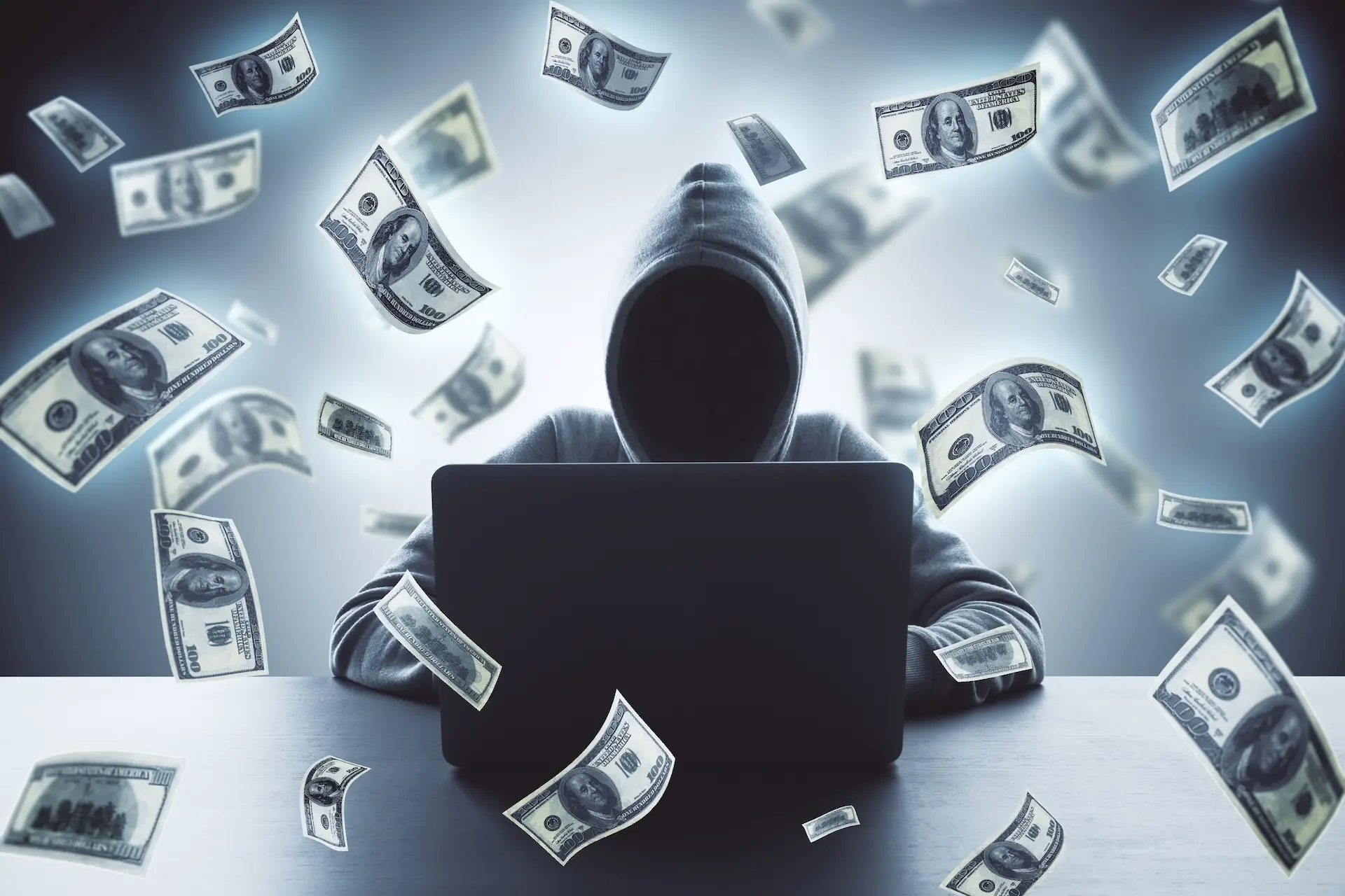 hacker using laptop and falling dollar banknote h 2026 03 26 04 46 26 utc